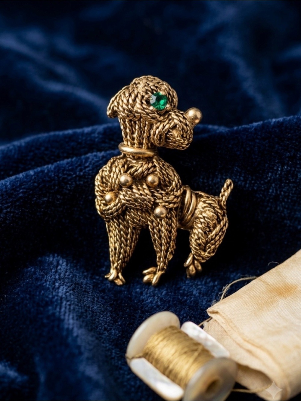 Gold-Tone Poodle Dog Brooch with Green Gem Eye